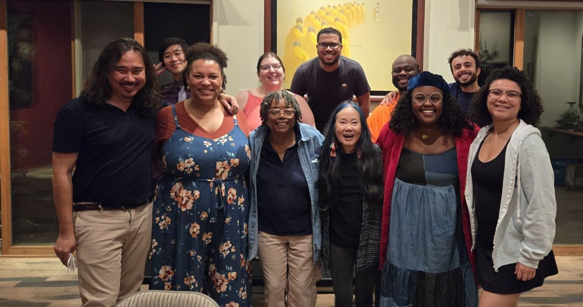 Mary with company members of Is This America?